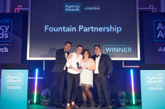 Chris & Hayley accepting the award for Integrated Search Agency of the year, 2023.