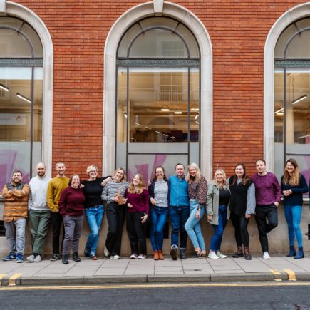 Photo of the Fountain team outside the Fountain offices. We had just moved into this fabulous new work space.